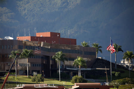 A U.S. flag waves at the U.S. Embassy in Caracas, Venezuela January 24, 2019. REUTERS/Carlos Garcia Rawlins