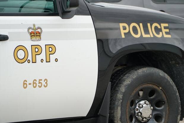 Ontario Provincial Police are investigating a single-vehicle crash involving a motorcycle on Highway 401 in Oshawa on Tuesday night. The crash has left a man, 31, with life-threatening injuries. (Paula Duhatschek/CBC - image credit)