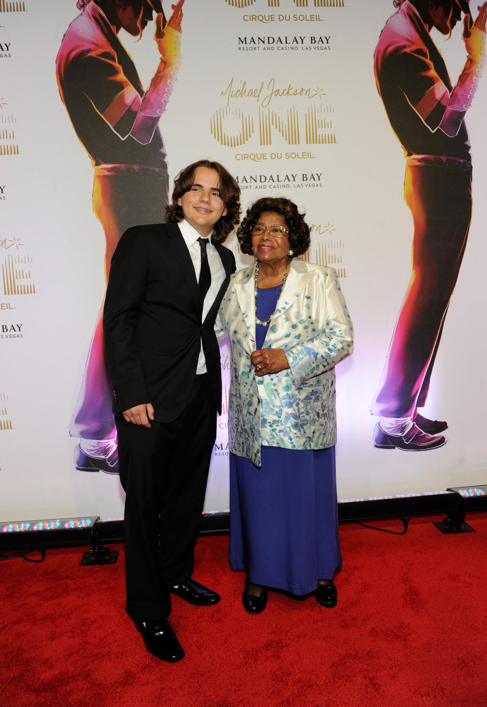 FILE - In this June 29, 2013 file photo, Prince Jackson, left, and Katherine Jackson arrive at the world premiere of "Michael Jackson ONE" at THEhotel at Mandalay Bay Resort and Casino, in Las Vegas. A Los Angeles jury will have to considering how much to award Jackson's three children and mother if they determine that concert promoter AEG Live LLC hired the doctor convicted of causing the superstar's June 2009 death. Deliberations are expected to begin on Thursday, Sept. 26, 2013, after a 21 week trial that has revealed many of Michael Jackson's ambitions, including a new career in filmmaking. (Photo by David Becker/Invision/AP, File)