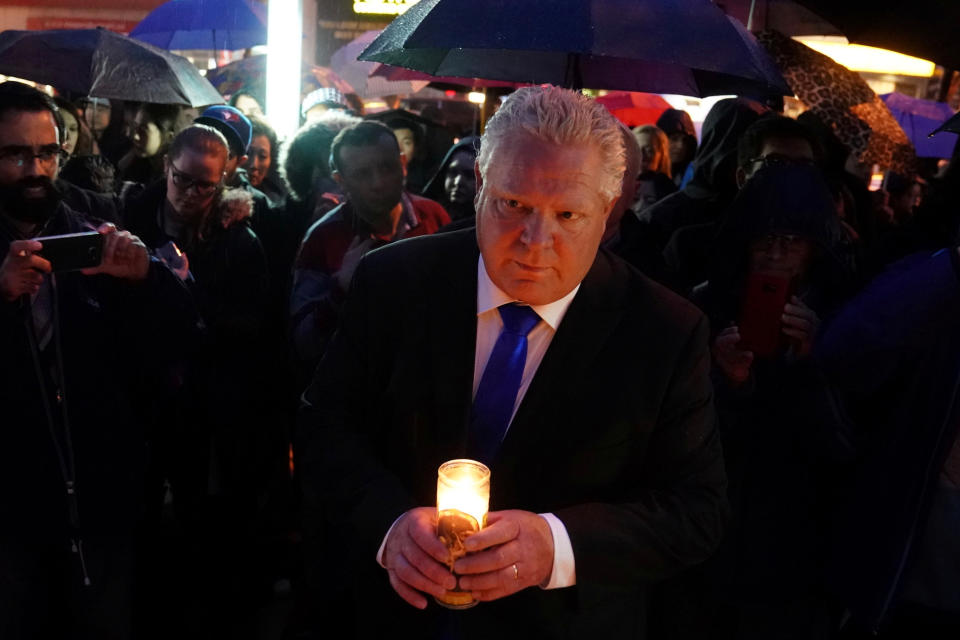 <p>Ontario PC Party leader Doug Ford attends a candle light vigil at the makeshift memorial a day after a van struck multiple people along a major intersection in north Toronto, Ontario, Canada, April 24, 2018. (Photo: Carlo Allegri/Reuters) </p>