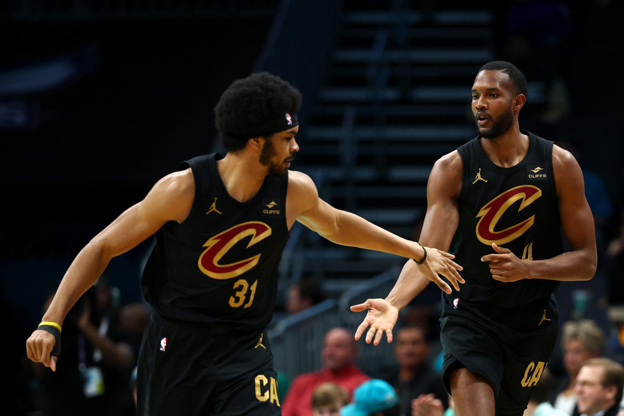CHARLOTTE, NORTH CAROLINA - MARCH 27: Jarrett Allen #31and Evan Mobley #4 of the Cleveland Cavaliers react during the first half of the game against the Charlotte Hornets at Spectrum Center on March 27, 2024 in Charlotte, North Carolina. NOTE TO USER: User expressly acknowledges and agrees that, by downloading and or using this photograph, User is consenting to the terms and conditions of the Getty Images License Agreement. (Photo by Jared C. Tilton/Getty Images)