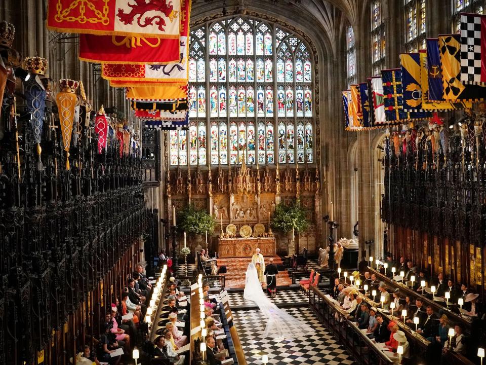 Prince Harry and Meghan Markle exchange vows during their wedding ceremony in St George's Chapel at Windsor Castle on May 19, 2018 in Windsor, England