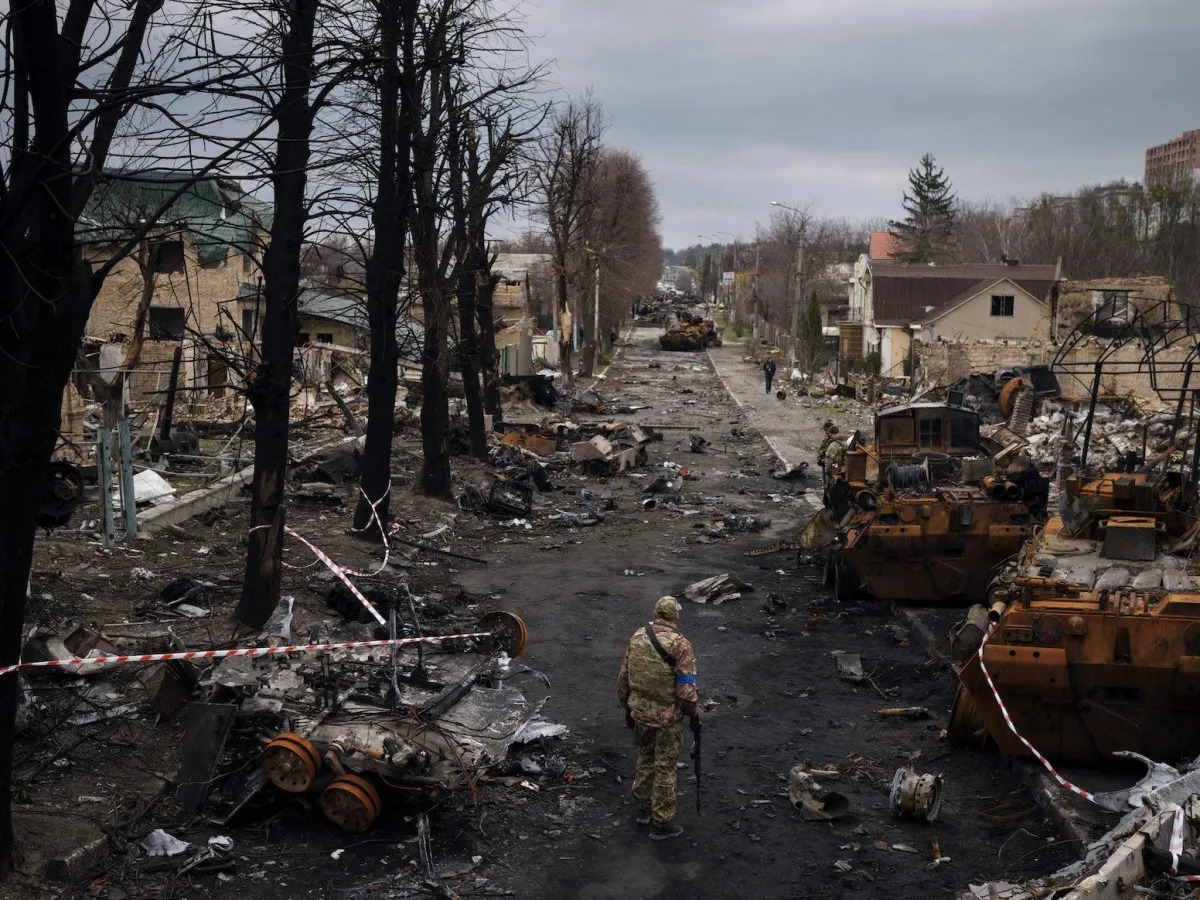 Videos show Russian soldiers leading a group of Ukrainian captives at gunpoint m..