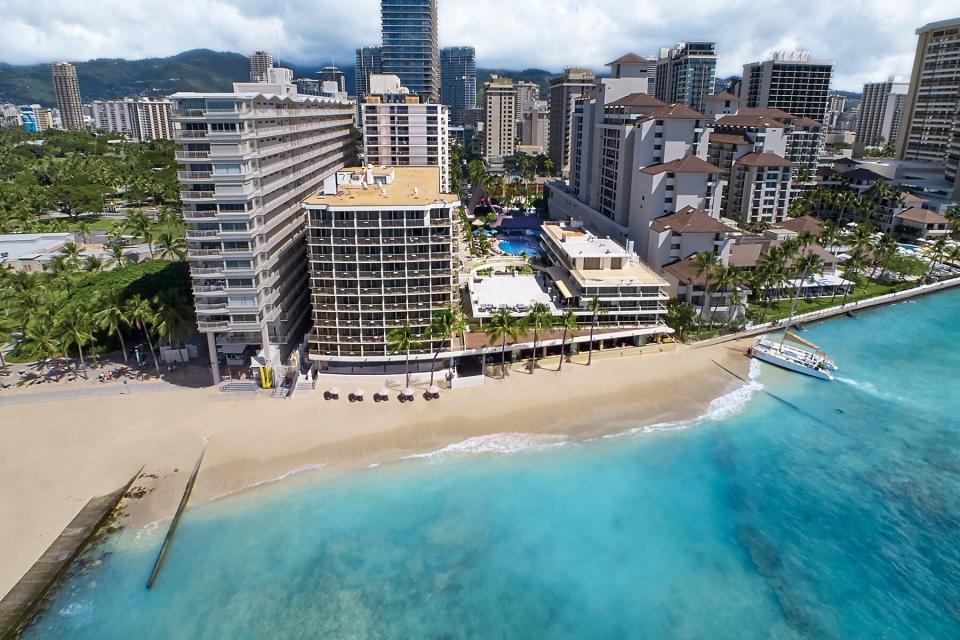 Aerial view of the beach and property at Outrigger Reef Waikiki Beach Resort