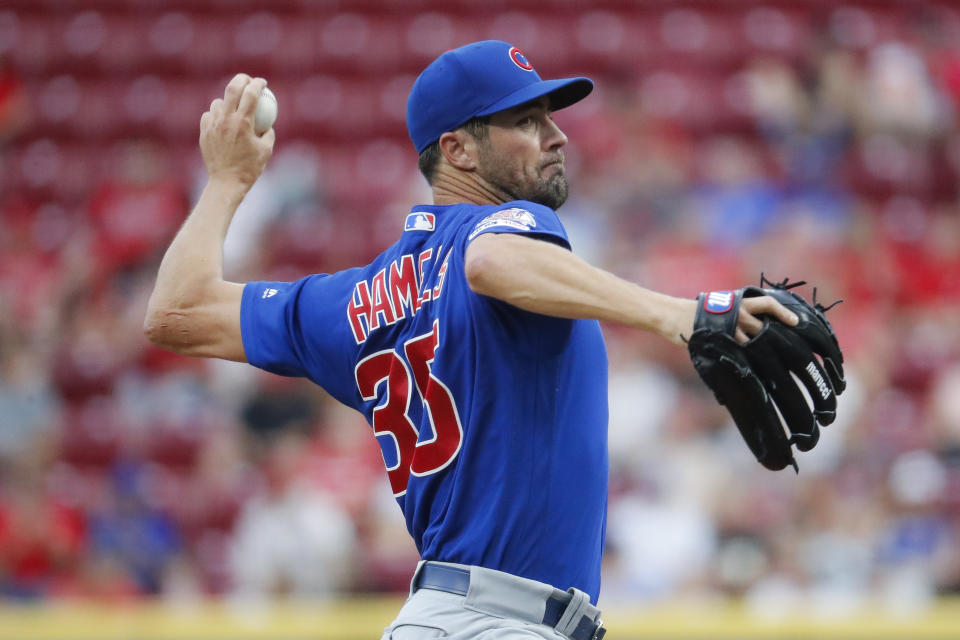 Chicago Cubs starting pitcher Cole Hamels throws during the first inning of the team's baseball game against the Cincinnati Reds, Thursday, Aug. 8, 2019, in Cincinnati. (AP Photo/John Minchillo)