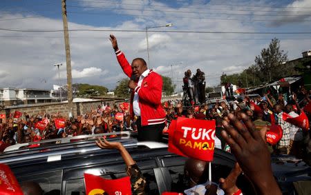 Kenya's President Uhuru Kenyatta addresses a Jubilee Party campaign caravan rally in Nairobi, Kenya October 23, 2017. REUTERS/Baz Ratner