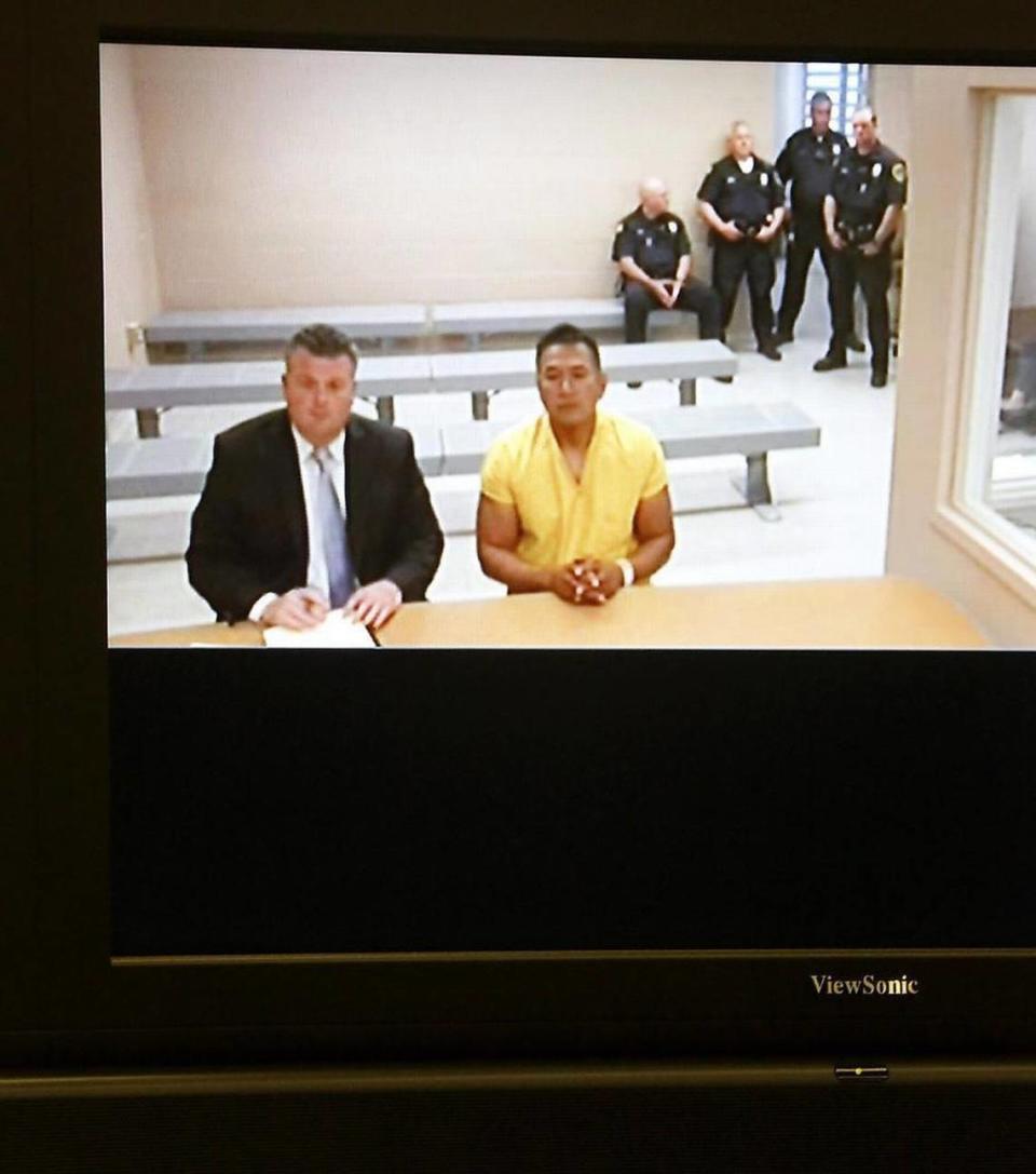 June 4, 2015 - Former Pasco Officer Richard Aguirre make his first appearance Wednesday with his attorney Scott Johnson, using a video link from jail, in Spokane District Court. Aguirre is being held on $500,000 bail for the 1986 murder of Ruby Doss of Spokane.