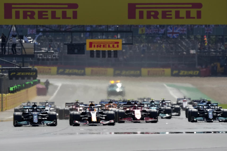 Drivers start the British Formula One Grand Prix, at the Silverstone circuit, in Silverstone, England, Sunday, July 18, 2021. (AP Photo/Jon Super)