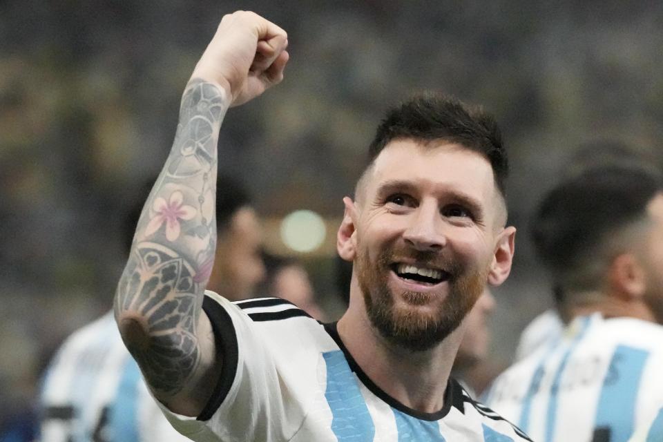 Argentina's Lionel Messi celebrates after the World Cup final soccer match between Argentina and France at the Lusail Stadium in Lusail, Qatar, Sunday, Dec. 18, 2022. (AP Photo/Frank Augstein)