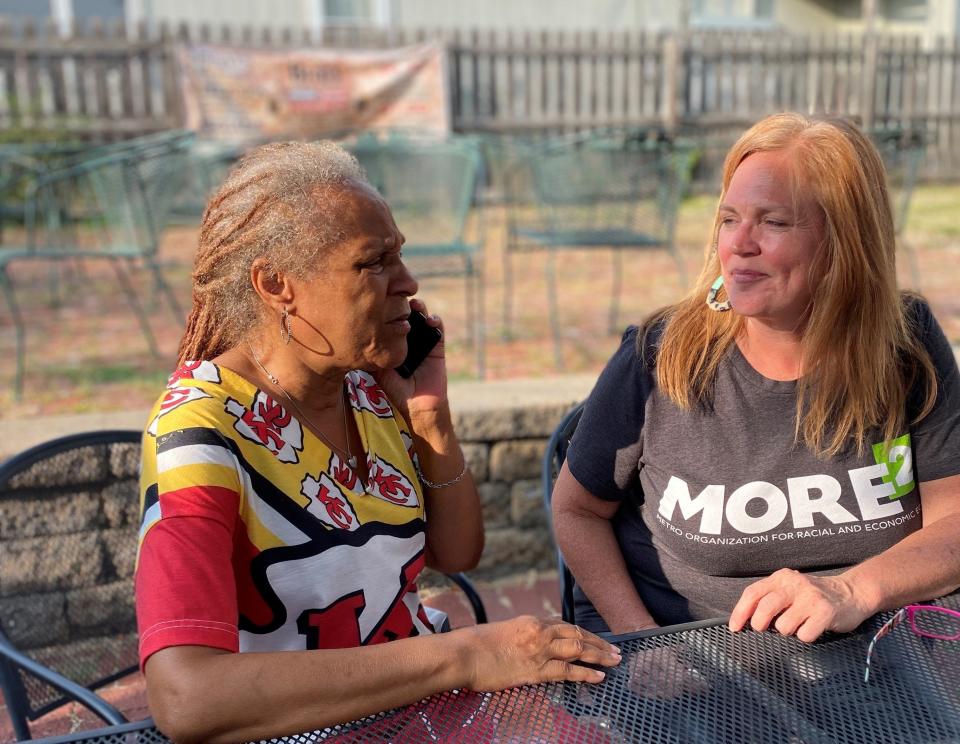 Ophelia Williams of Kansas City, Kansas talks with Lora McDonald, executive director of a community organization called MORE2 on Thursday, Sept. 15, 2022, the same day former police Detective Roger Golubski was arrested on federal civil rights crimes stemming from Williams' sexual assault.