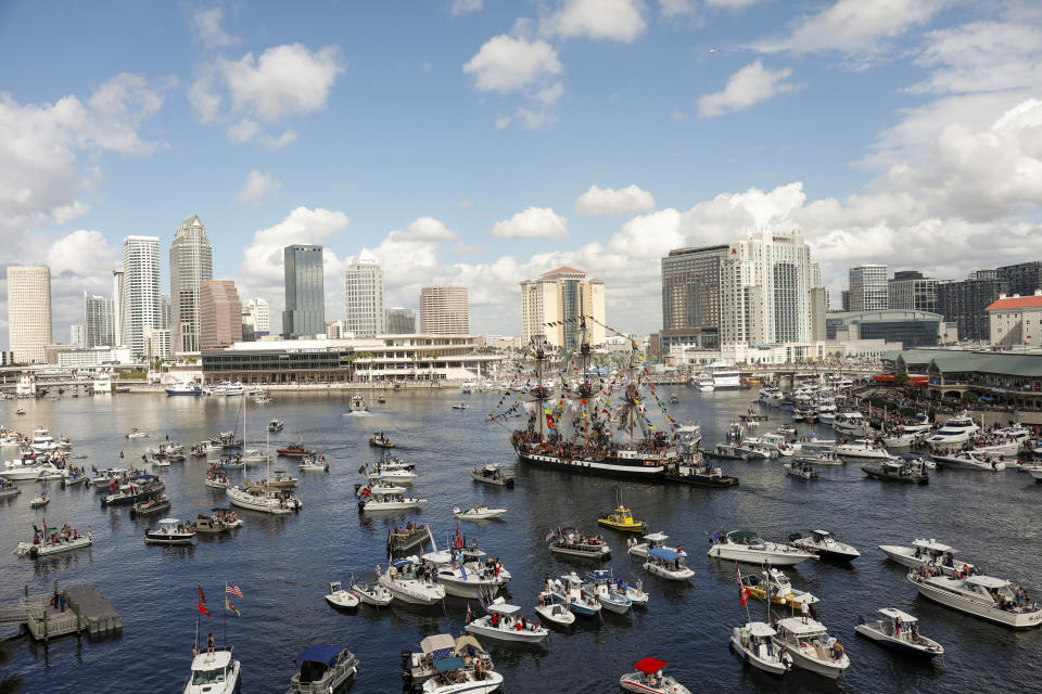 The Jose Gasparilla pirate ship carries members of Ye Mystic Krewe of Gasparilla en route to the Tampa Convention Center during the Gasparilla Invasion on Saturday, Jan. 27, 2024, in Tampa. (Louis Santana/Tampa Bay Times via AP)