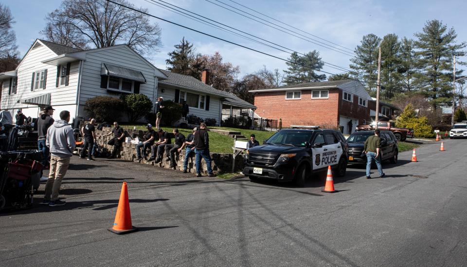 Crews, along with a police car being used as a prop, outside a home on Glenbrook Road in Nyack April 9, 2014 where a shoot for the television show "Law and Order SVU" was being shot.