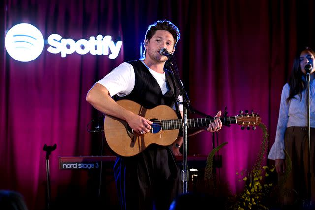 <p>Noam Galai/Getty Images for Spotify</p> Niall Horan performing at 'The Show' Spotify album release event with fans in June 2023 in New York City