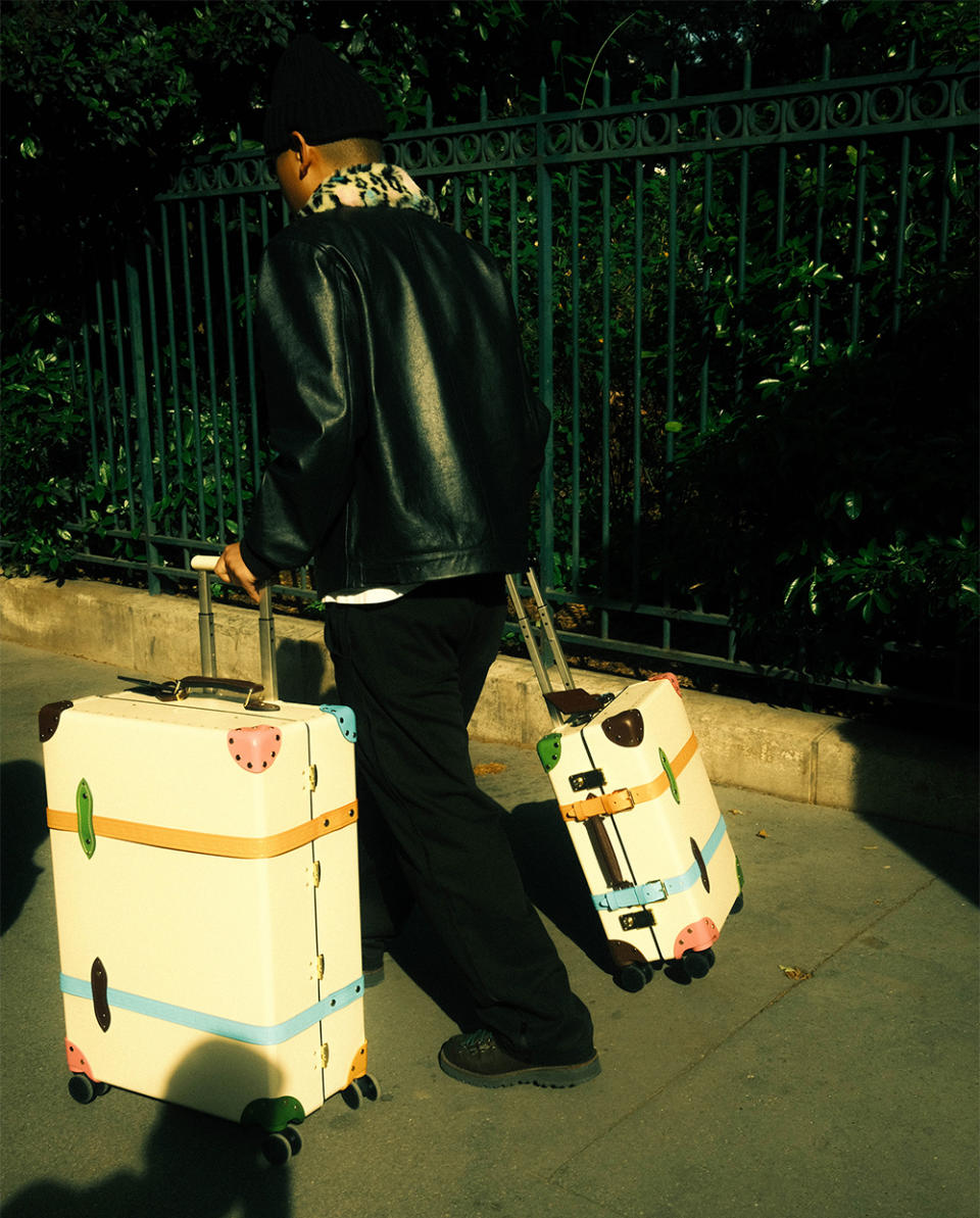 Both version of the new Golf le Fleur x Globe-Trotter four-wheel suitcases.