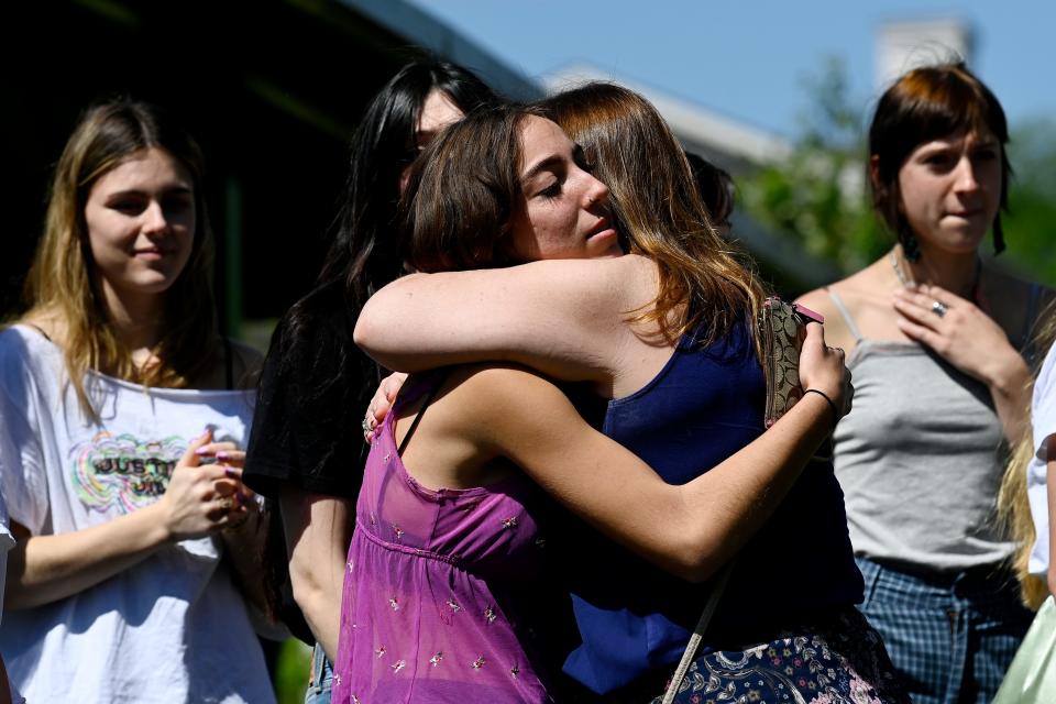 Belmont University student Gilda Colaiaco hugs Jessica Ludwig, mother of Jillian, during an Edgehill community memorial blessing and plaque dedication honoring Jillian at William Edmondson Homesite Park & Gardens on Saturday, April 13, 2024, in Nashville, Tenn.