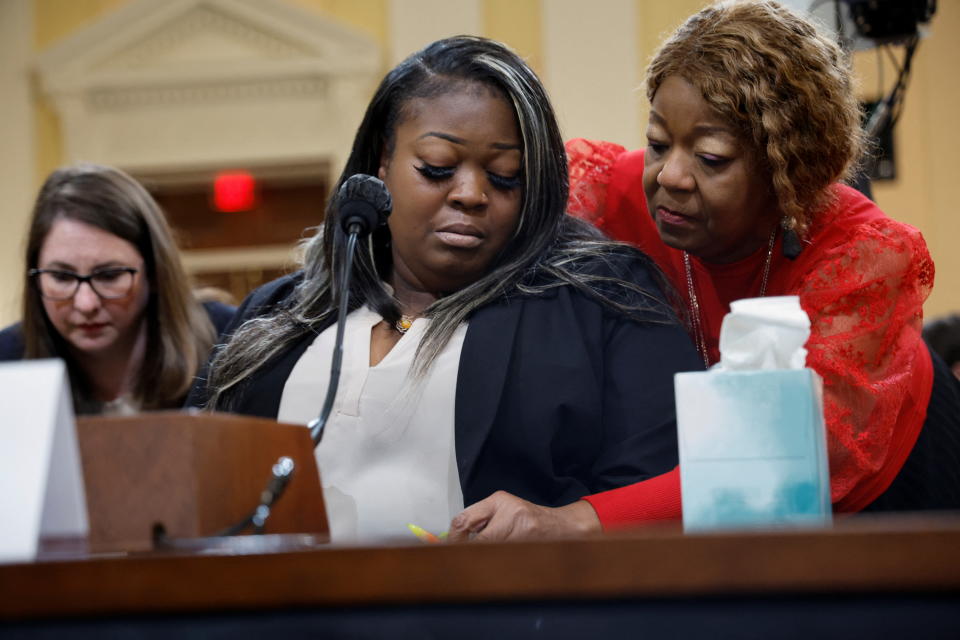 Moss and her mother, “Lady” Ruby Freeman, at the hearing.