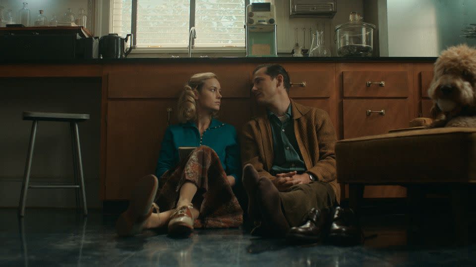 Brie Larson and Lewis Pullman in "Lessons in Chemistry." - Apple TV+