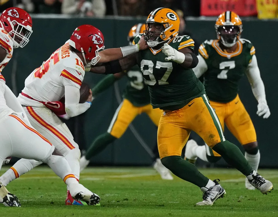 Green Bay Packers defensive tackle Kenny Clark (97) sacks Kansas City Chiefs quarterback Patrick Mahomes during the first quarter of their game Dec. 3 at Lambeau Field.