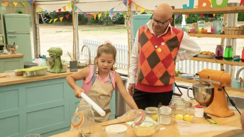 Harry Hill and contestant on Junior Bake Off