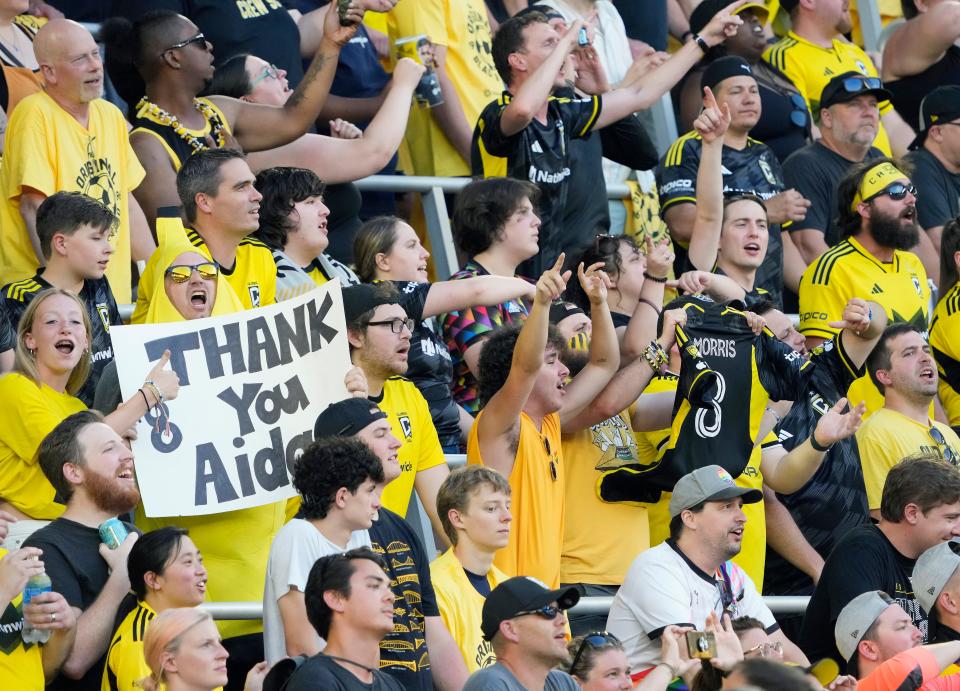 Jun 22, 2024; Columbus, OH, USA; Columbus Crew fans support Columbus Crew midfielder Aidan Morris (8) during the first half of their MLS game against Sporting KC at Lower.com Field.