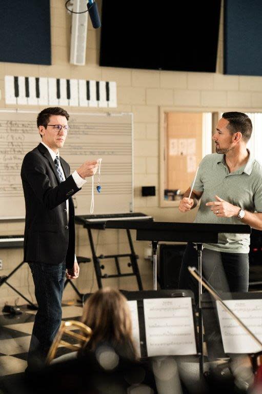 Bay Port High School band director Kyle Siegrist, left, stars with Green Bay Packers head coach Matt LaFleur in a new Bellin Health ad that premiered Sunday during Super Bowl LVIII.