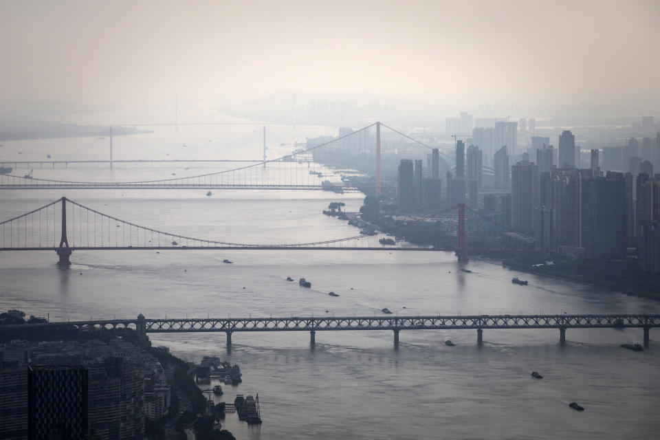 Bridges over the Yangtze River are seen from the Wuhan Greenland center during its construction August 11, 2020, in Wuhan, China. / Credit: Getty Images