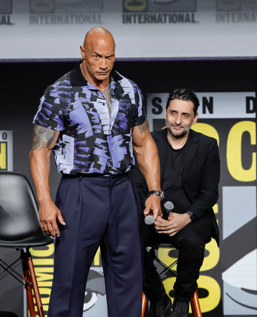 Dwayne Johnson and Jaume Collet-Serra speak onstage at the Warner Bros. theatrical panel