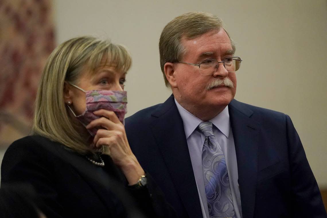 David Harris, right, and Birgit Fladager, both of the Stanislaus County District Attorney’s office, stand during a break in a hearing at San Mateo County Superior Court in Redwood City, Calif., Monday, Feb. 28, 2022. (AP Photo/Jeff Chiu, Pool)