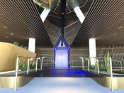 A digital walkway with mirrored ceiling serves as the entrance to the social hub of Virgin Galactic's digs at Spaceport America near Upham, New Mexico, on Thursday, Aug. 15, 2019. Virgin Galactic unveiled some of the interior spaces of the custom-tailored terminal Thursday, saying the designs are aimed at connecting the customers with operations as they prepare for their suborbital flights. (AP Photos/Susan Montoya Bryan)