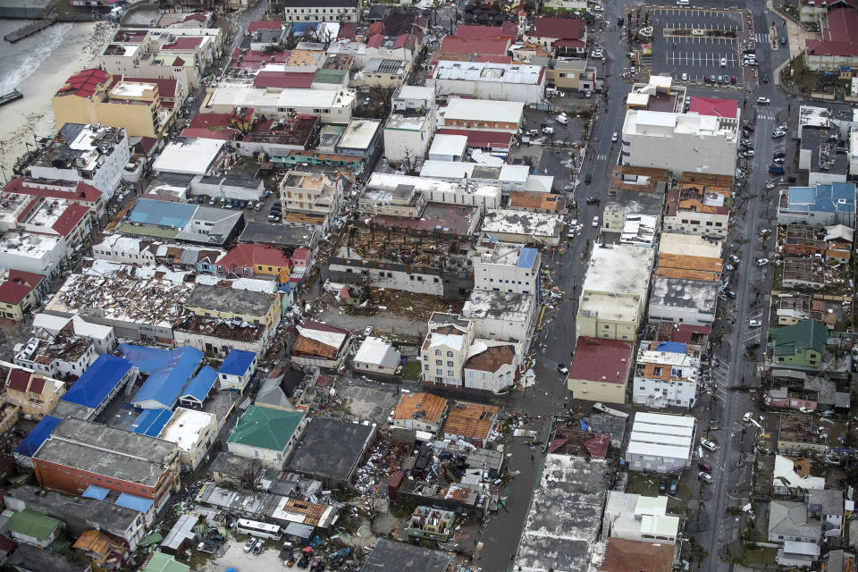 <p>Storm damage in the aftermath of Hurricane Irma, in St. Maarten. Irma cut a path of devastation across the northern Caribbean, leaving thousands homeless after destroying buildings and uprooting trees. Significant damage was reported on the island that is split between French and Dutch control. (Photo: Gerben Van Es/Dutch Defense Ministry via AP) </p>