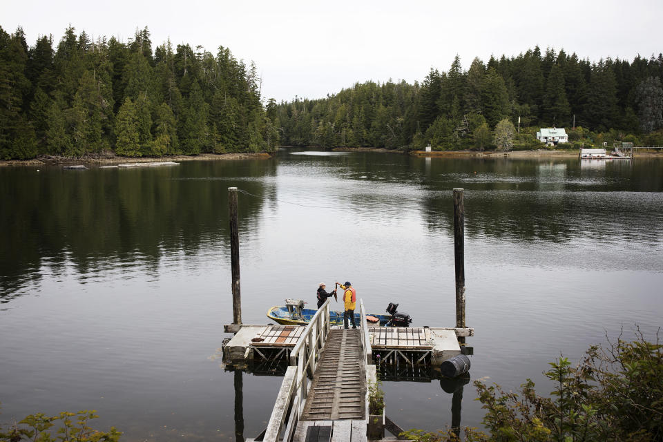 Amy McConnell and Louis Druehl analyze a piece of kelp from Druehl's dock in Bamfield, on Vancouver Island.<span class="copyright">Melissa Renwick for TIME</span>