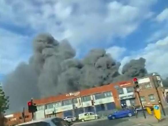 Photo taken from the Twitter feed of the London Fire Brigade of smoke coming from a fire in Minerva Road: PA