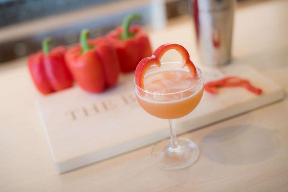 PHOTO: The Red Lady cocktail uses red bell pepper and orange bitters for a sweet and herbaceous kick. (The Botanist Gin)