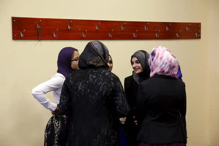 People gather in anticipation of remarks by U.S. President Barack Obama at the Islamic Society of Baltimore mosque in Catonsville, Maryland February 3, 2016. REUTERS/Jonathan Ernst