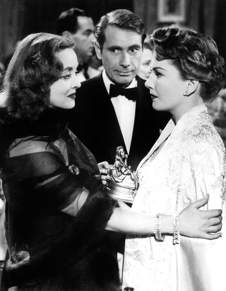 <a href="http://movies.yahoo.com/movie/all-about-eve/" data-ylk="slk:ALL ABOUT EVE;elm:context_link;itc:0;sec:content-canvas" class="link ">ALL ABOUT EVE</a> (1950) <br> Directed by: <span>Joseph L. Mankiewicz</span> <br>Starring: <span>Bette Davis</span>, <span>Anne Baxter</span> and <span>George Sanders</span>