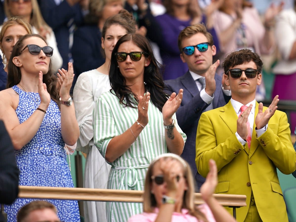 Jennifer Dodds, Eve Muirhead and Tom Daley in the Royal Box during day six of the 2022 Wimbledon Championships (PA)