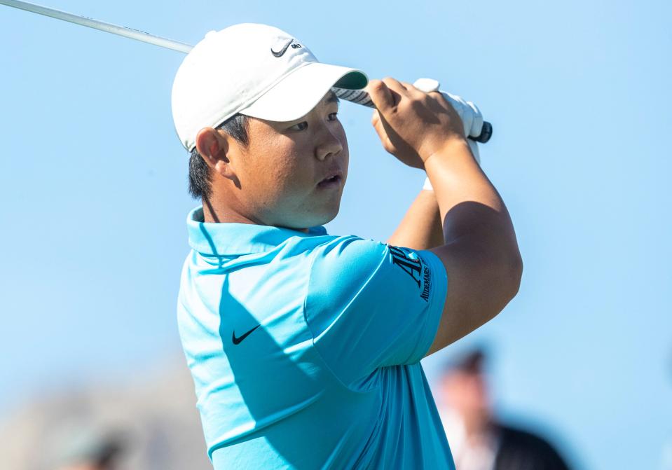 Tom Kim tees off on hole one to start the final round of The American Express on the Pete Dye Stadium Course at PGA West in La Quinta, Calif., Sunday, Jan. 22, 2023. 