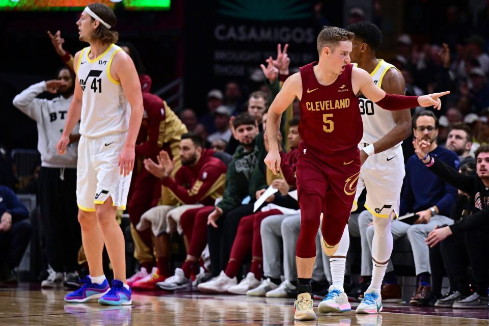 Cleveland Cavaliers guard Sam Merrill reacts after a 3-pointer against the Utah Jazz on Wednesday in Cleveland.