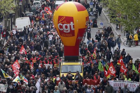 French CGT trade union workers attend a demonstration against the French labour law proposal in Paris, France, as part of a nationwide labor reform protests and strikes, April 28, 2016. REUTERS/Charles Platiau