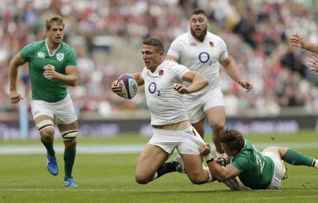 Rugby Union - England v Ireland - QBE International - Twickenham Stadium, London, England - 5/9/15 Sam Burgess of England gets tackled by Ian Madigan of Ireland Action Images via Reuters / Henry Browne