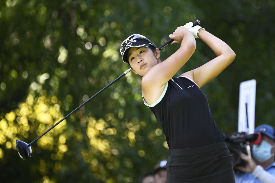 Andrea Lee, of the United States, hits from the 12th hole during the final round of the LPGA Portland Classic golf tournament in Portland, Ore., Sunday, Sept. 18, 2022. (AP Photo/Troy Wayrynen)