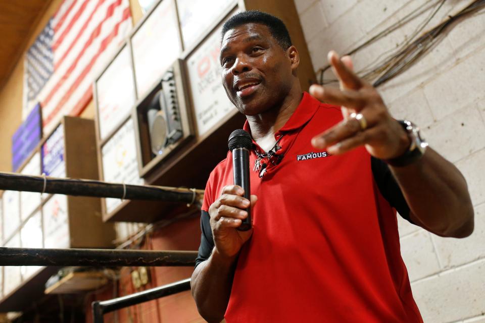 Republican Senate candidate Herschel Walker speaks to supporters at the Northeast Georgia Livestock Barn in Athens, Ga., on Wednesday, July 20, 2022. Walker spoke about gas prices and the November election. 
