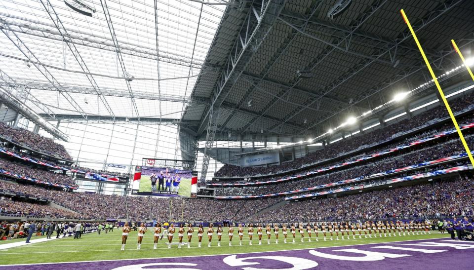 <p>Minnesota Vikings cheerleaders line up on the field before an NFL preseason football game against the San Diego Chargers in Minneapolis. The Vikings will host the Green Bay Packers in the first regular season game in the new stadium Sunday, Sept. 18. The Vikings are expecting the $1.1 billion translucent building to be a significant advantage for them with 66,000 roaring fans packing the place all fall. (AP Photo/Jim Mone,File) </p>