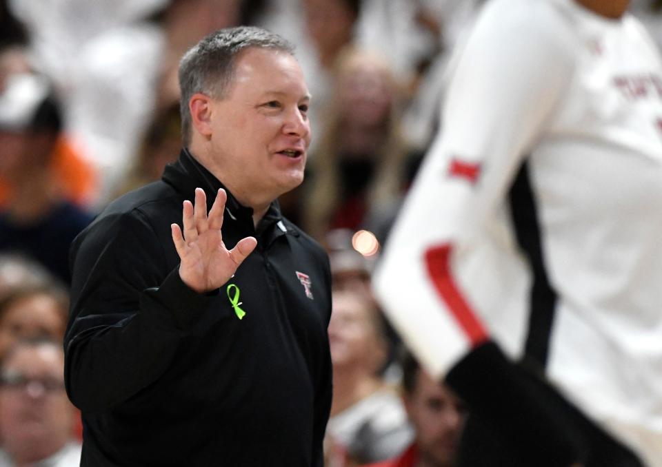 Texas Tech's head volleyball coach Tony Graystone stands one the sidelines at the Big 12 volleyball match against Texas, Sunday, Oct. 2, 2022, at United Supermarkets Arena.