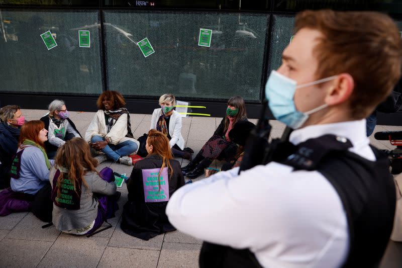 Extinction Rebellion activists protest at Canary Wharf in London
