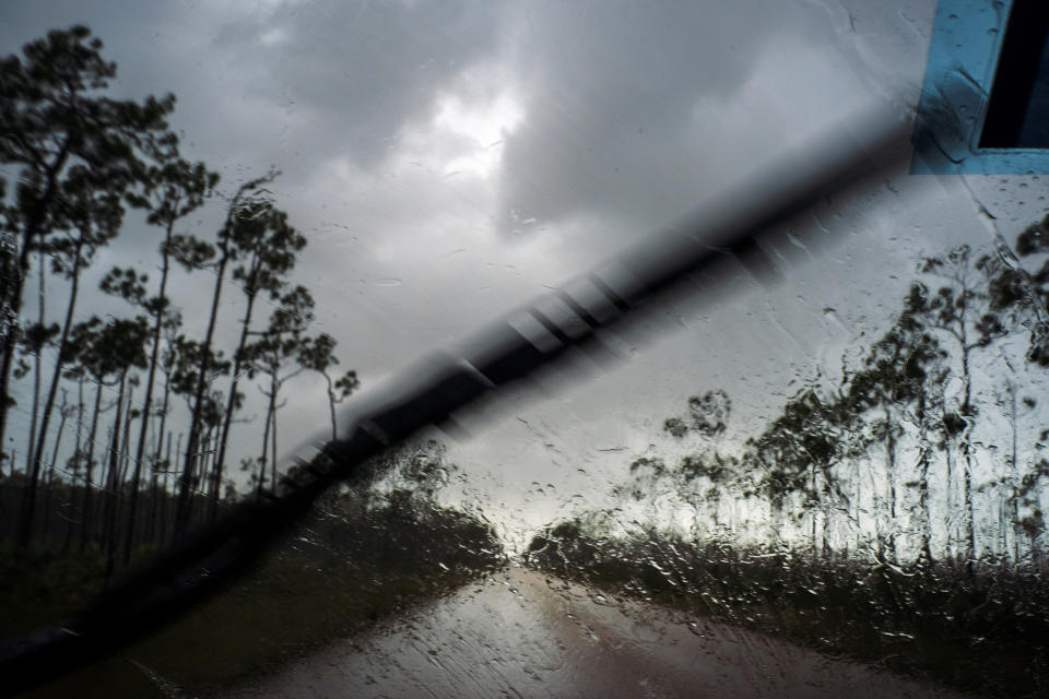 A car returns to the capital under the previous rain before the arrival of Hurricane Dorian in Freeport, Grand Bahama, Bahamas, Sept. 1, 2019. (Photo: Ramon Espinosa/AP)