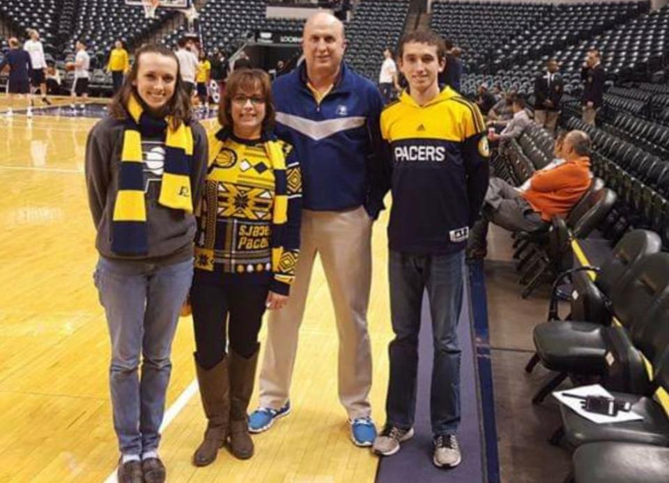 The Smith family, longtime Pacers season ticket holders, inside Gainbridge Fieldhouse. From left, Jaclyn, Becky, Willie and Jason.