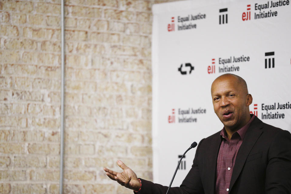 FILE - In this April 23, 2018, file photo, Bryan Stevenson speaks at a news conference in Montgomery, Ala., about the National Memorial for Peace and Justice, and the Legacy Museum opening that will honor thousands of people killed in lynchings. “Our continued silence about the history of racial injustice has fueled many of the current problems surrounding police violence, mass incarceration, racial inequality and the disparate impact of COVID-19,” said Stevenson, director of the Equal Justice Initiative. (AP Photo/Brynn Anderson, File)