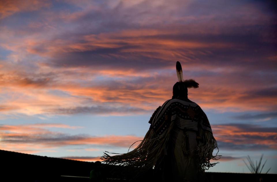 FILE--In this July 13, 2018, file photo, a woman performs a traditional Native American dance during the North American Indian Days celebration on the Blackfeet Indian Reservation in Browning, Mont. A study released by a Native American non-profit says numerous police departments in cities nationwide are not adequately identifying or reporting cases of missing and murdered indigenous women. (AP Photo/David Goldman, file)