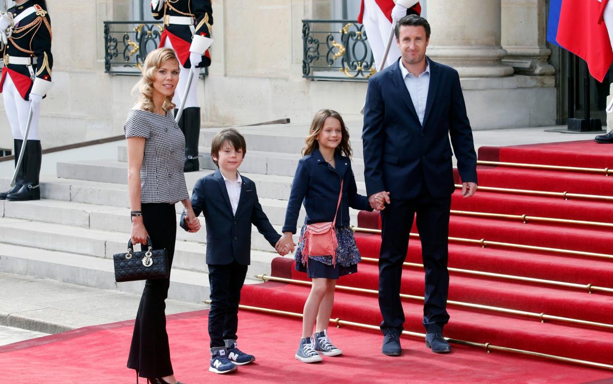 Tiphaine Auziere and her husband Antoine Choteau arrive with their children at the Elysee presidential palace on May 7, 2022